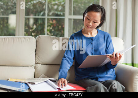 An old man is reading. Stock Photo