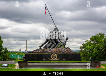 United States Marine Corp War memorial depicting flag planting on Iwo Jima in WWII with Washington Memorial and Capitol Building in background in Arli
