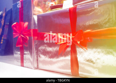 gift boxes with red ribbons. toned image Stock Photo