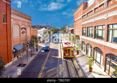 Ybor City Tampa Bay, Florida. January 19 , 2019  . Top view of Street Car and vintage buildings in 8th ave on sky blue background. Stock Photo