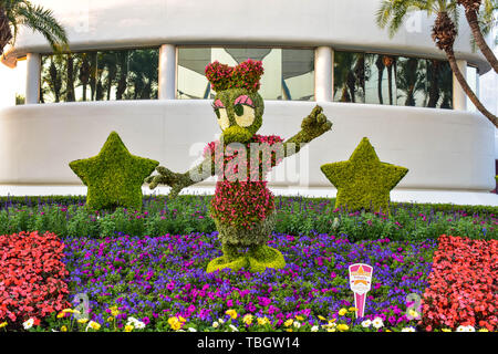 Orlando, Florida . March 27, 2019. Daisy duck topiarie on colorful scenery at Epcot in Walt Disney World  (2) Stock Photo