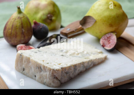 Gorgonzola dolce Italian blue cheese, made from unskimmed cow's milk in North of Italy served with fresh figs and pears Stock Photo