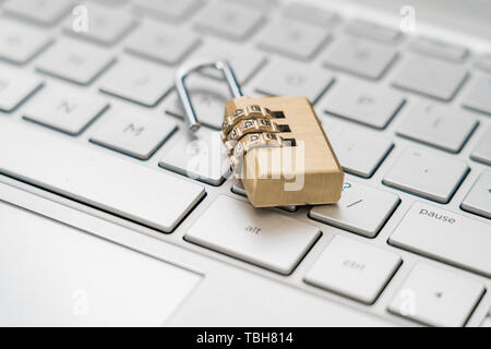 Lock on laptop keyboard Stock Photo