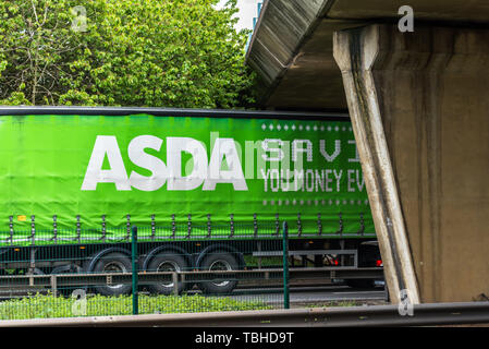 Northampton, UK - May 10th 2019: asda truck on uk motorway in fast motion Stock Photo