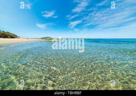 Rocks in the water in Orri beach. Sardinia, Italy Stock Photo