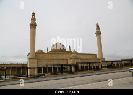 AZERBAIJAN, JUMA MOSQUE-CIRCA MAY 2019--unidentified people near the mosque Stock Photo