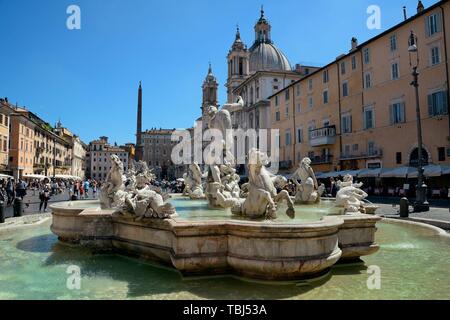 ROME - MAY 12: Piazza Navona with tourists on May 12, 2016 in Rome, Italy. Rome ranked 14th in the world, and 1st the most popular tourism attraction in Italy. Stock Photo