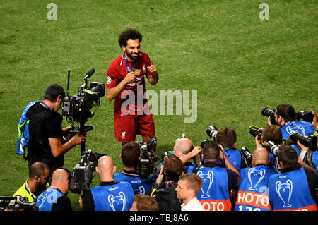 Liverpool's Mohamed Salah poses for the worlds media with his medal following the UEFA Champions League Final at the Wanda Metropolitano, Madrid. Stock Photo