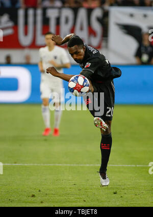 Washington DC, USA. 1st June, 2019. D.C. United Defender (20) Jalen Robinson clears the ball during an MLS soccer match between the D.C. United and the San Jose Earthquakes at Audi Field in Washington DC. Justin Cooper/CSM/Alamy Live News Stock Photo