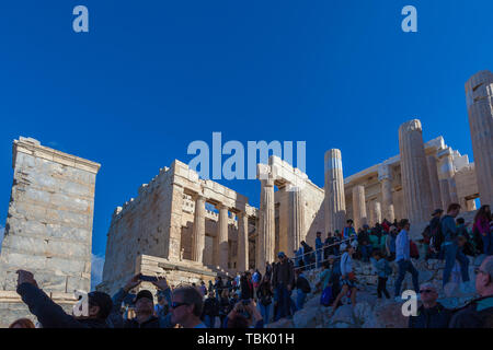 ATHENS GREECE - OCTOBER 25 2018: Crowd of tourists in the Acropolis Propylaea Stock Photo