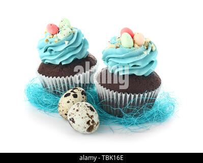 Sweet Easter cupcakes on white background Stock Photo