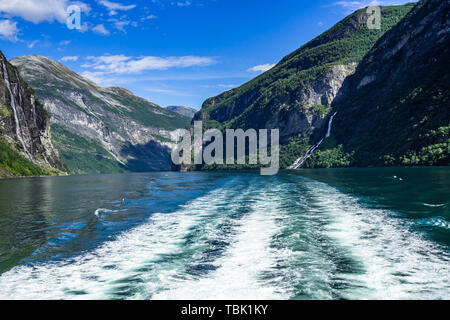 Geiranger Fjord with two of the most famous waterfalls: on the left the Seven Sisters Waterfall, on the right the Suitor (or Friar) Waterfall, Norway Stock Photo