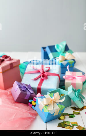 Different gift boxes on white table Stock Photo