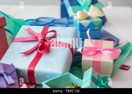 Different gift boxes on white table Stock Photo