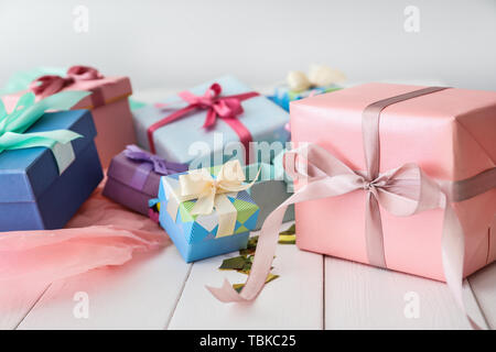 Different gift boxes on white table Stock Photo