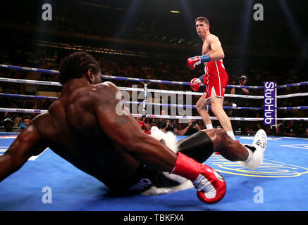 Callum Smith (right) in action against Hassan N'Dam in the WBA 'Super' World, WBC Diamond, Ring Magazine Super-Middlesweight title fight at Madison Square Garden, New York. Stock Photo