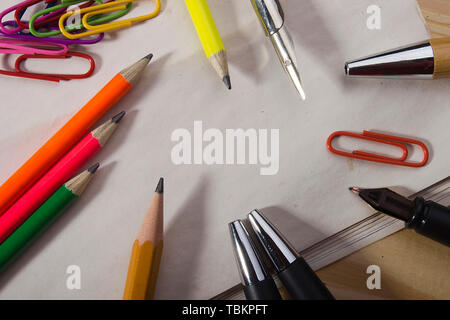 Stationery and blank sheets of paper on the table Stock Photo