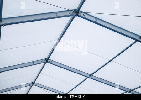 Blue Steel frame tents Background. Inside Big Canvas Tent Stock Photo