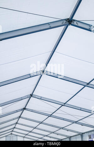 Blue Steel frame tents Background. Inside Big Canvas Tent Stock Photo