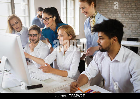 Creative business people working on business project in office Stock Photo