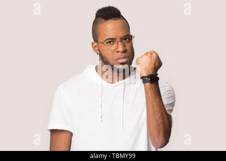 Grateful black man hold hands at chest feeling thankful Stock Photo