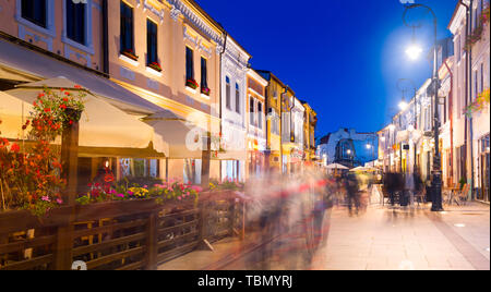 Nightlife of lighted Craiova streets in warm autumn, Romania Stock Photo