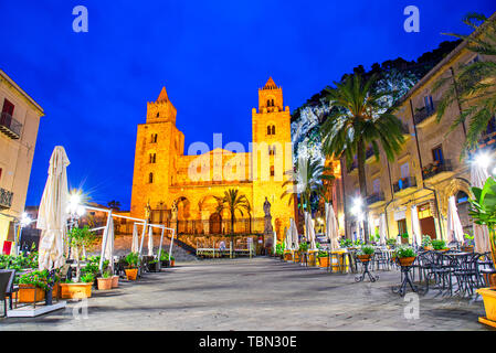 Cefalu, Sicily, Italy: Night view of the town square with The Cathedral or Basilica of Cefalu, Duomo di Cefalu, a Roman Catholic church built in the N Stock Photo