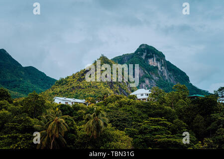 Villas sitting in mountains on Mahe Island, Seychelles Stock Photo