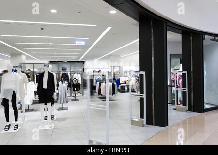 Designer clothing and jewelry boutiques in modern shopping plaza Gustavia  St Barts Stock Photo - Alamy