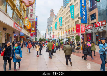 SHANGHAI, CHINA - DEC 28, 2016: People walking on Nanjing road in Downtown of Shanghai. The area is the main shopping district of the city and one of Stock Photo