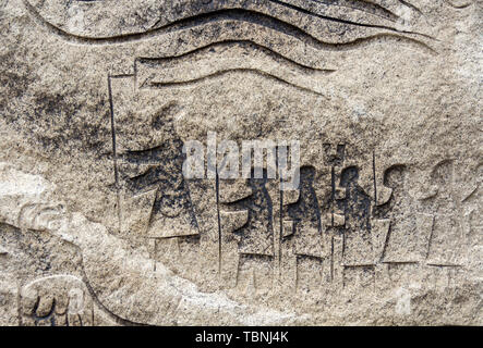 Stone carving in Qianfoshan Scenic Area Stock Photo