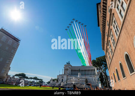 Rome, Italy - June 2, 2019: Italian acrobatic aerial team 'Frecce Tricolore' flying over Altar of the Fatherland at Republic Day in Rome, Italy Stock Photo