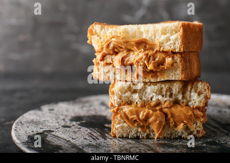 Sandwiches with peanut butter on plate, closeup Stock Photo