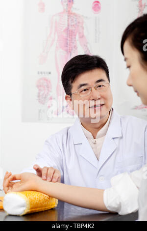 Doctors diagnose patients. Stock Photo