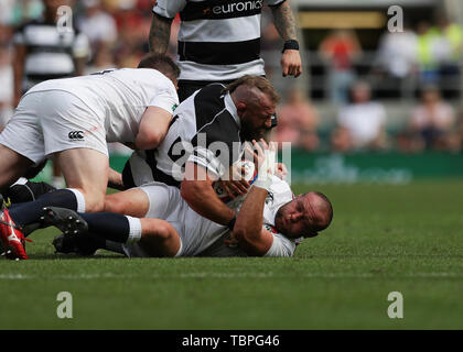 Twickenham, London, UK. 2nd June, 2019. International Rugby, England XV versus Barbarians; Joe Marler of Barbarians tackles Tom Dunn of England Credit: Action Plus Sports/Alamy Live News Stock Photo