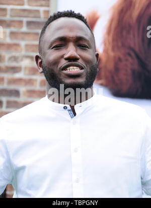 Hannibal Buress attends the premiere of 