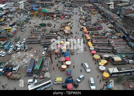 Srinagar. 3rd June, 2019. Aerial photo taken on June 3, 2019 shows people shopping at a market in preparation of Eid al-Fitr festival in Aanatnag town, about 55 km south of Srinagar city, the summer capital of Indian-controlled Kashmir. Credit: Javed Dar/Xinhua/Alamy Live News Stock Photo