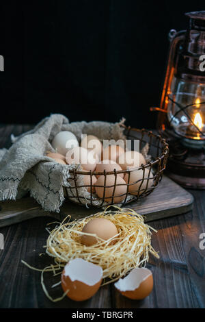 Eggs in basket, vintage style Stock Photo