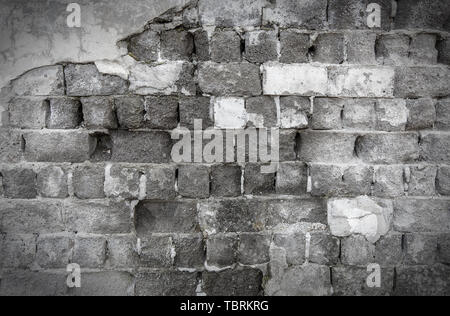 Urban background, white ruined industrial brick wall with copy space Stock Photo