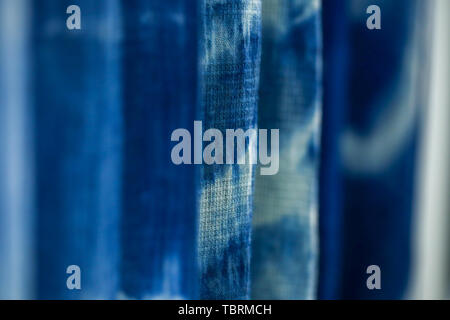 Batik braid glowing dots abstract background Stock Photo