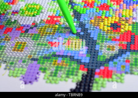 Diamond painting close-up Stock Photo