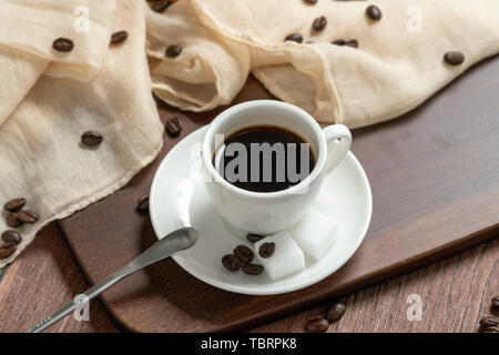 Dark brown background on table cloth and coffee Stock Photo