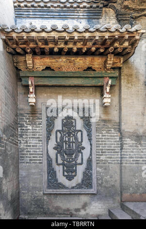 Ancient building brick carving wall in Cao Jia compound (Sanduo Hall), Taigu, Shanxi Province Stock Photo