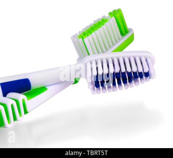 Two toothbrushes over white background Stock Photo