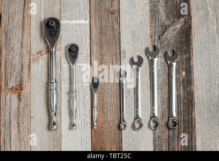 Tools, set wrenches on a wood background. Top view Stock Photo