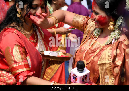 Sindur Khela, literally meaning 'vermillion game', is a Bengali