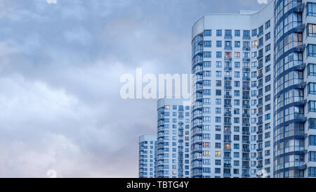 Real estate background. Ukrainian real estate market. Urban abstract background. Apartment building. Image of side view of big building with apparteme Stock Photo