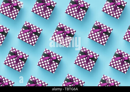 Multiple gift boxes over blue background, top view Stock Photo