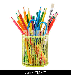 Colored pencils and various colorful stationery for school in a metal holder or cup. Isolated on white. Stock Photo
