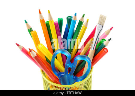 Colored pencils and various colorful stationery for school in a metal holder or cup. Isolated on white. Stock Photo